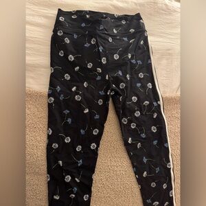 The Upside Black leggings with Blue and White daisy design